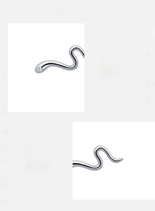 Macro detail of s925 silver snake stud earrings with high-grade zircon stone inlay