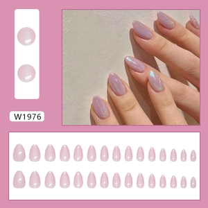 Pink purple cat-eye press on nails in long oval shape shown on hands and in full set box