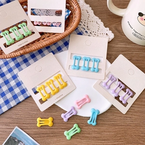 Cute macaron color bone shaped hair clips set in pink green and blue matte finish