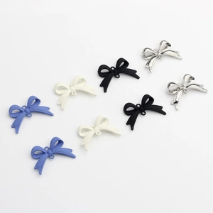 Matte and metallic alloy bow pendants in blue, white, black and silver for DIY jewelry