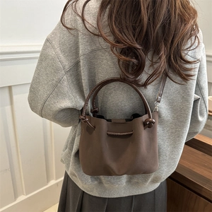 Vintage dark brown suede tote bag with dual handles and knot detail for women