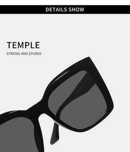 Detail view of the strong and sturdy temple arm of black oversized square sunglasses