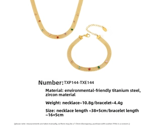 Macro detail of gold-plated mesh necklace and bracelet set with colorful zircon stones