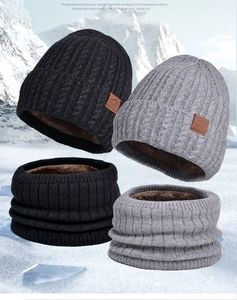 Detailed knit texture and soft fleece lining of this winter hat and neck warmer set
