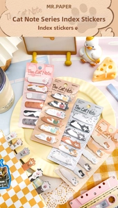 Cute cat-themed index stickers applied on notebooks with 180 pieces per pack