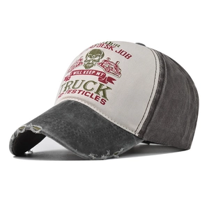 Detail of washed cotton baseball cap featuring vintage truck and skull graphic print