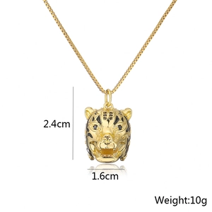 Detailed view of 18K gold plated leopard pendant with size specs 2.4cm by 1.6cm