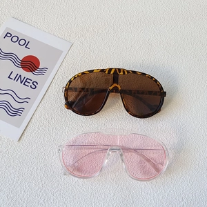 Retro oversized kids sports sunglasses in leopard and clear pink frames with UV protection
