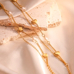 Double-layer gold plated stainless steel bracelet with heart, star charms and white pearls