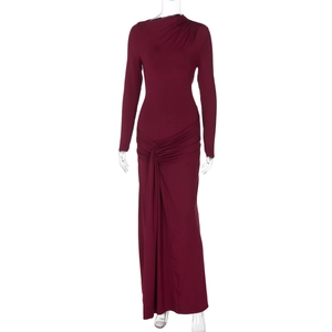 Detailed view of the elegant wine red ruched maxi dress with long sleeves and draping