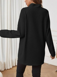 Detail view of the high-quality black fleece maternity top with a stand collar design