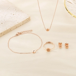 Rose gold cat paw jewelry set including necklace, bracelet, ring, and stud earrings