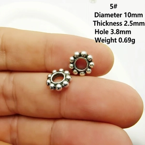 Détail de la perle intercalaire flocon en argent antique 10mm avec dimensions