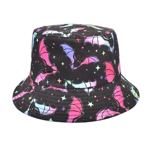 Close-up of vibrant pink and purple bat star patterns on a black bucket hat detail
