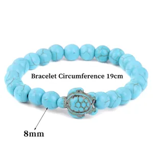 Blue turquoise bead bracelet with 8mm stones and turtle charm for women on white background