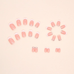 Classic nude French press-on nails with white tips and sparkling silver glitter accents