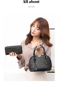 Close-up of black shell handbag and long wallet with sparkling gold sequins detail