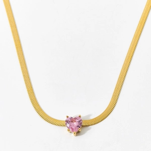 Minimalist gold snake chain necklace featuring a sparkling pink heart zirconia pendant