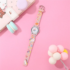 Macro shot of a pink 3D silicone unicorn watch band with cute rainbow relief patterns