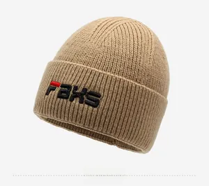 Detail of khaki ribbed knit beanie featuring 3D Faxs embroidery and fold-over cuff