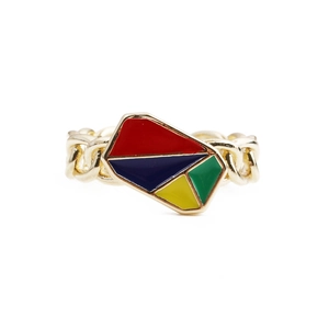 Detailed view of gold-plated chain ring with colorful geometric enamel inlays