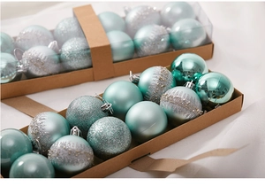 Detail of 6cm blue Christmas ornaments with matte, glossy, and silver glitter finishes