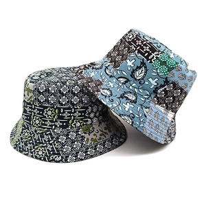 Double-sided paisley bucket hat with floral ethnic print for sun protection and fashion