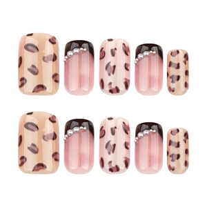 30-piece leopard print press-on nails with French black tips and pearl accents