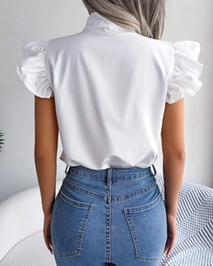 Rear view of white chiffon blouse featuring double-layered ruffle sleeves and round neck