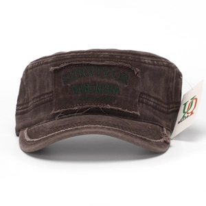 Close-up of vintage washed brown cadet cap featuring survivor patch and cotton texture