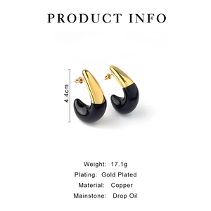 Detail view of gold-plated drop earrings showing 4.4cm height and drip oil finish