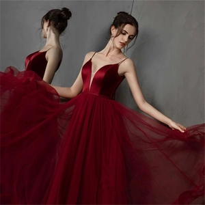 Elegant wine red V-neck ball gown with velvet bodice and layered tulle skirt