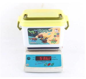 Dismantled dinosaur toy set including 4 part bags and electric screwdriver weighing 536g