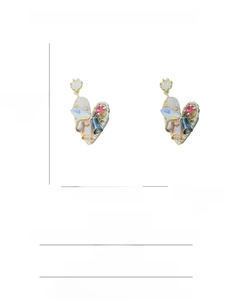 Macro shot of colorful zircon heart earrings with S925 silver needles and gold base