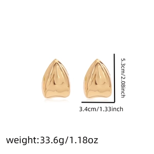 Detailed view of gold-tone grillz with precise dimensions 5.3cm x 3.4cm and weight info