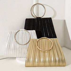 Elegant pleated evening clutch bags in black, silver, and gold with round metal handles