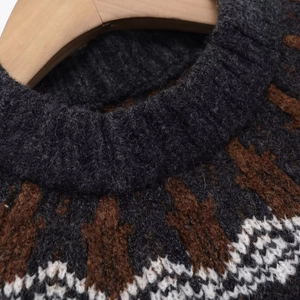 Vintage Fair Isle knit sweater with intricate jacquard pattern in dark grey and brown