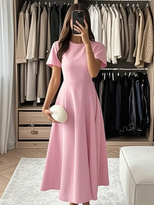 Detailed view of pink A-line evening dress with short sleeves and elegant draped fabric