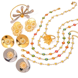 Golden 18k stainless steel jewelry set featuring colorful enamel daisy pendants