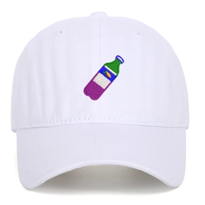 Detailed close-up of colorful bottle embroidery on a white washed cotton baseball cap