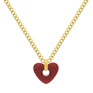 Minimalist golden heart necklace featuring a red hollow zircon pendant on a white background