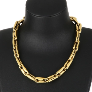 Polished gold coffee bean link chain necklace displayed on a professional black bust