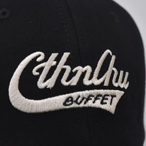 Black cotton baseball cap with high-density beige Cthnhu and BUFFET embroidery details