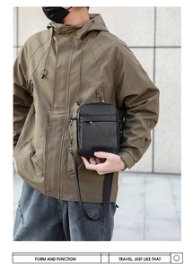 Male model wearing a black PU leather crossbody bag with zipper and woven strap details