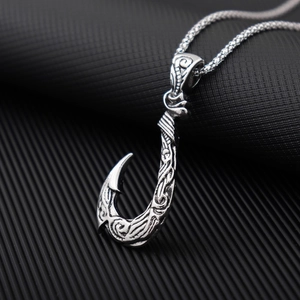 Vintage silver fish hook pendant necklace with intricate engraved nautical details