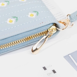 Blue long PU leather wallet with daisy embroidery and gold zipper detail