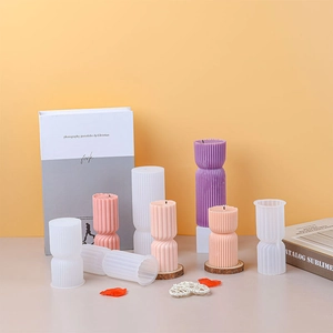 Cylindrical silicone molds for scented candles with vertical stripes and geometric patterns