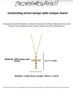 Macro shot of S925 silver cross pendant with colorful zircon and wrinkled texture