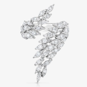 Macro detail of silver feather ring with marquise-cut zircons and open-band design