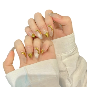 Elegant cat-eye press-on nails with golden wheat ear foil and pink gradient finish